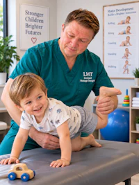 a young boy is being helped by a physiotherapist