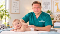 a baby is being massaged by a doctor